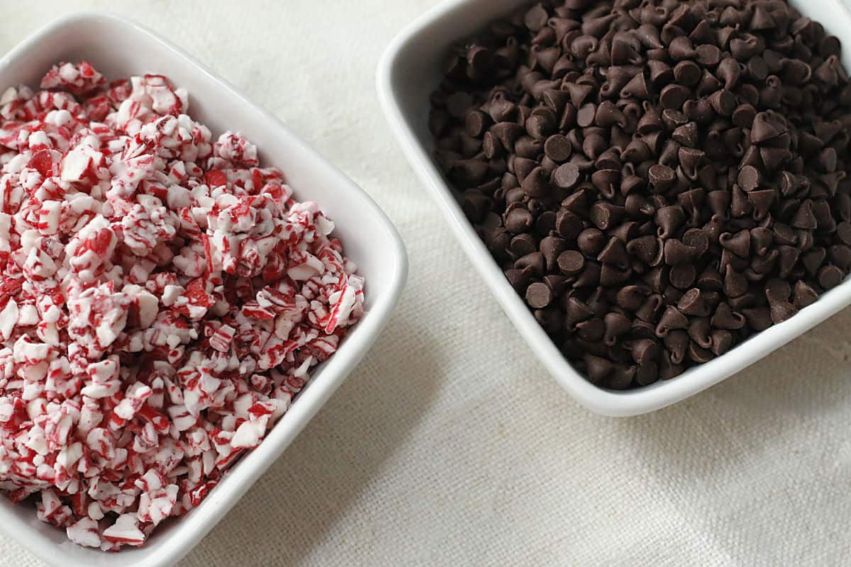 Bowls of chopped candy canes and chocolate chips