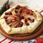 Homemade apple galette on a wood board.