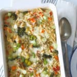 A baked turkey rice casserole baked fresh from the oven in a white dish.