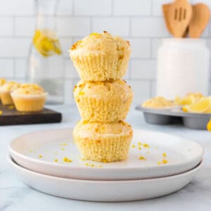 Three lemon muffins stacked on each other.