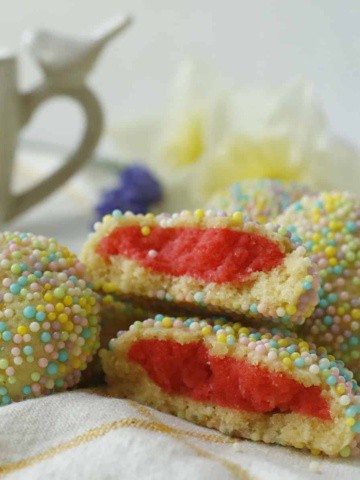 Raspberry Sprinkle Cookies with a cup of tea.