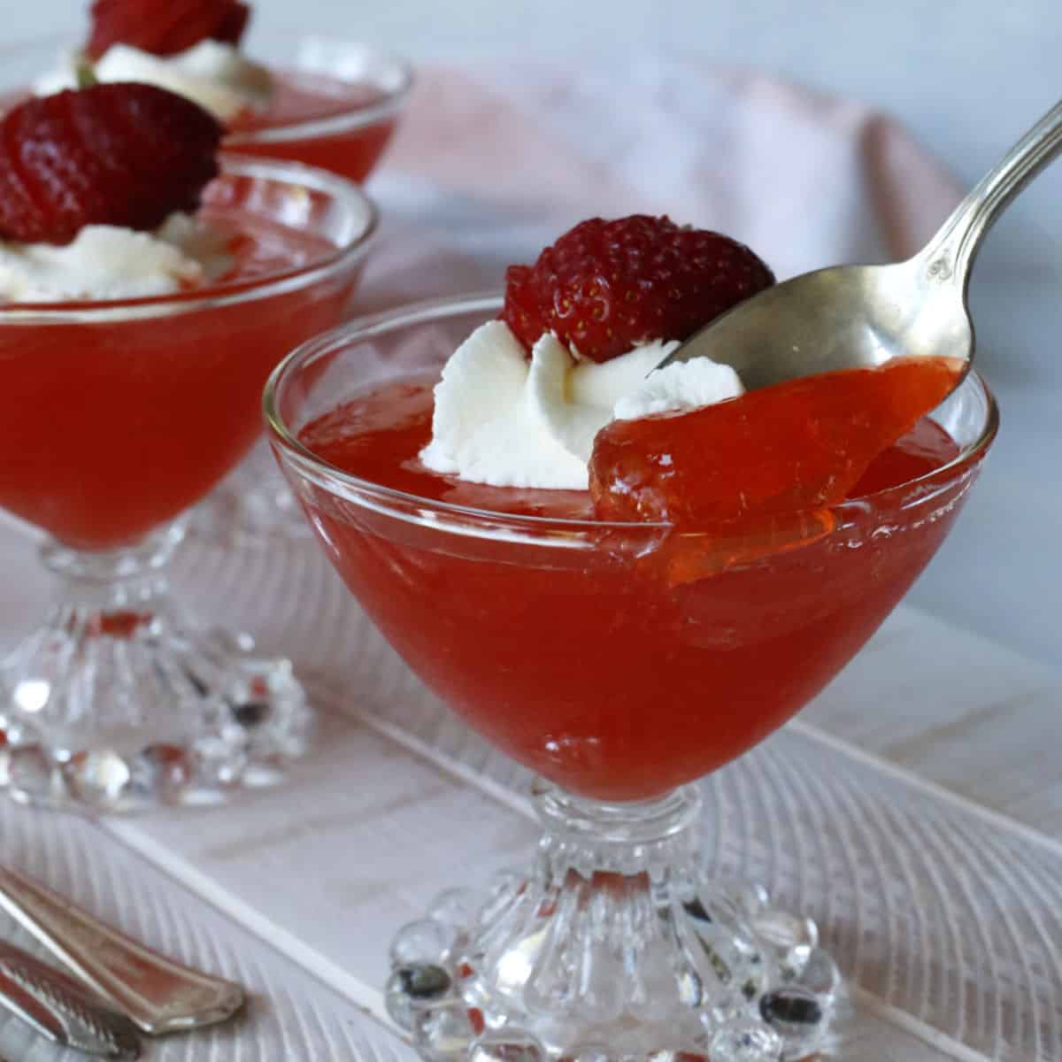Strawberry gelee in a dessert glass.