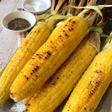 Grilled ears of corn.