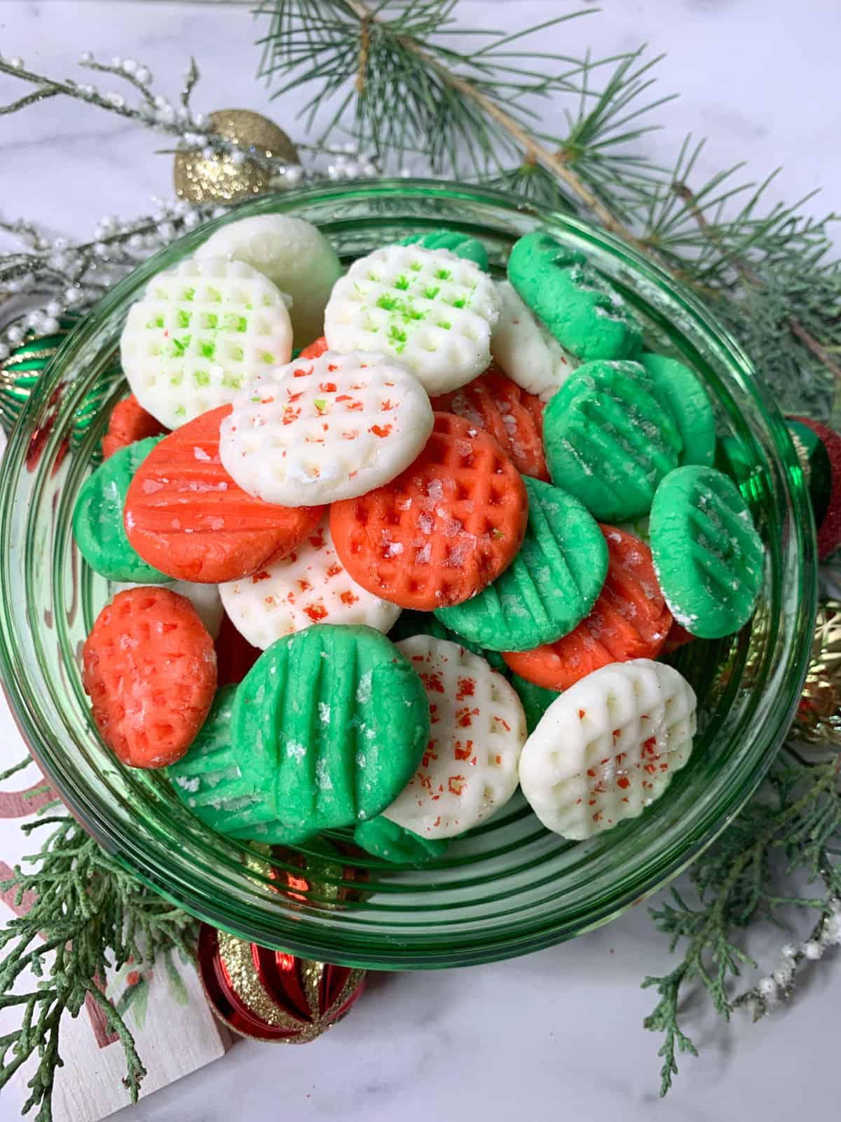 Christmas candy in a green dish.