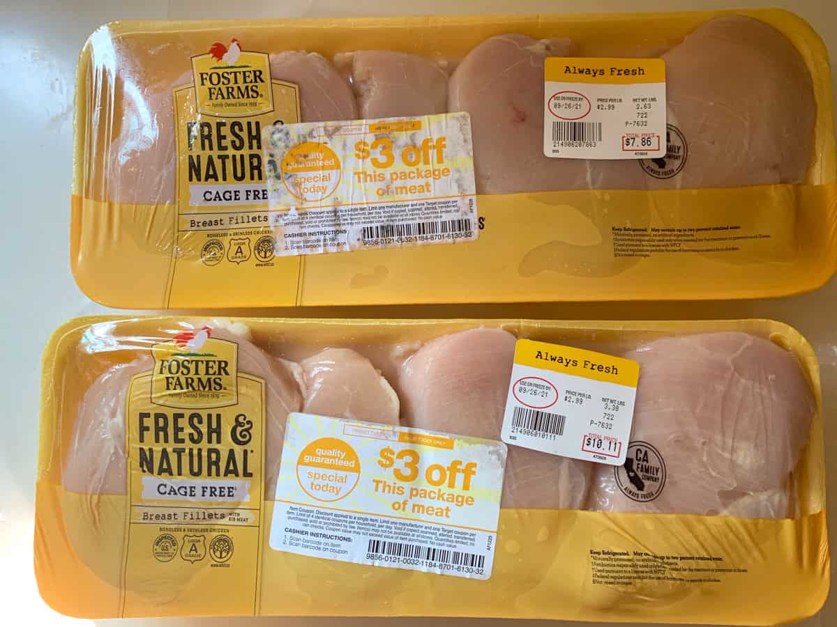 Two packages of chicken breasts.