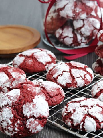 Red Velvet cookies on a cooling rack.