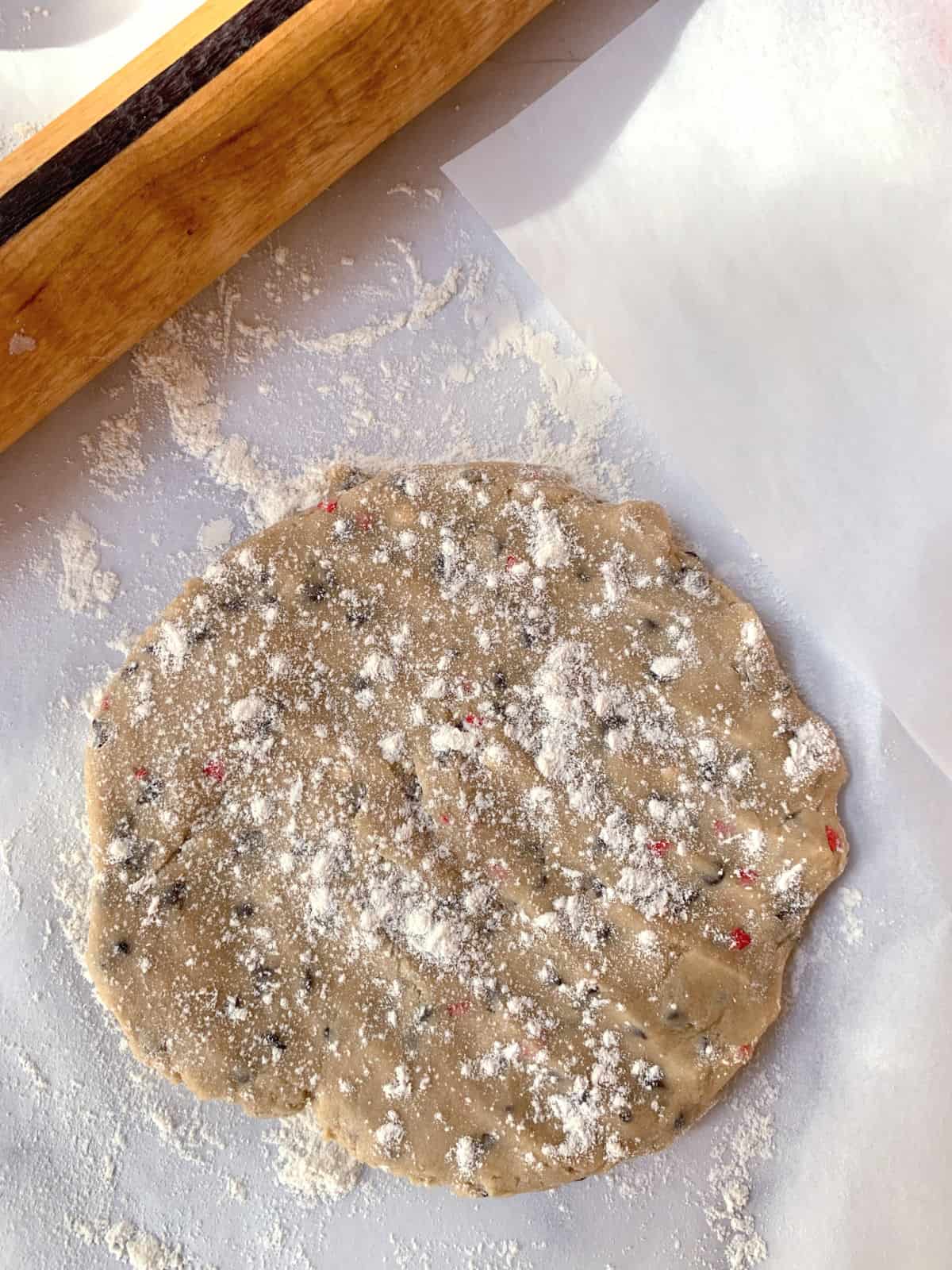 Cookie dough on a floured board.