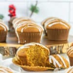 Gingerbread muffins with icing on a plate.