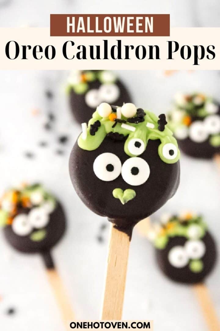 Halloween-themed Oreo pops resembling cauldrons with green frosting, candy eyes, and sprinkles on wooden sticks. Text reads 'Halloween Oreo Cauldron Pops.'
