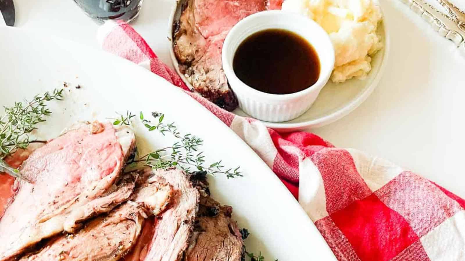 Sliced rib roast on a platter.