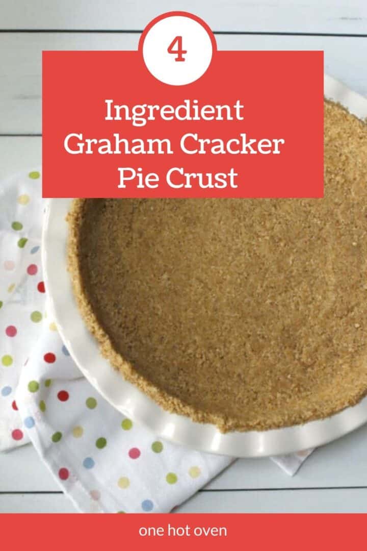 A graham cracker pie crust in a white dish sits on a white surface with a colorful polka dot cloth nearby. Text overlay reads: "4 Ingredient Graham Cracker Pie Crust.