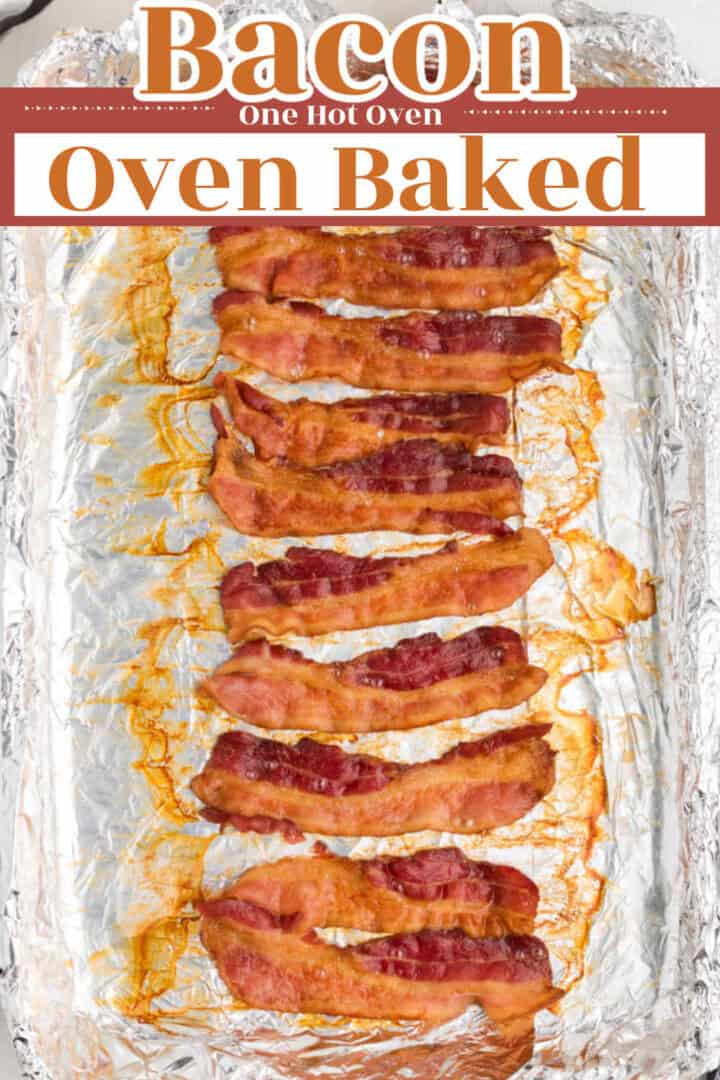 Cooked bacon strips on a foil-lined baking sheet with text reading "Bacon Oven Baked" at the top of the image.