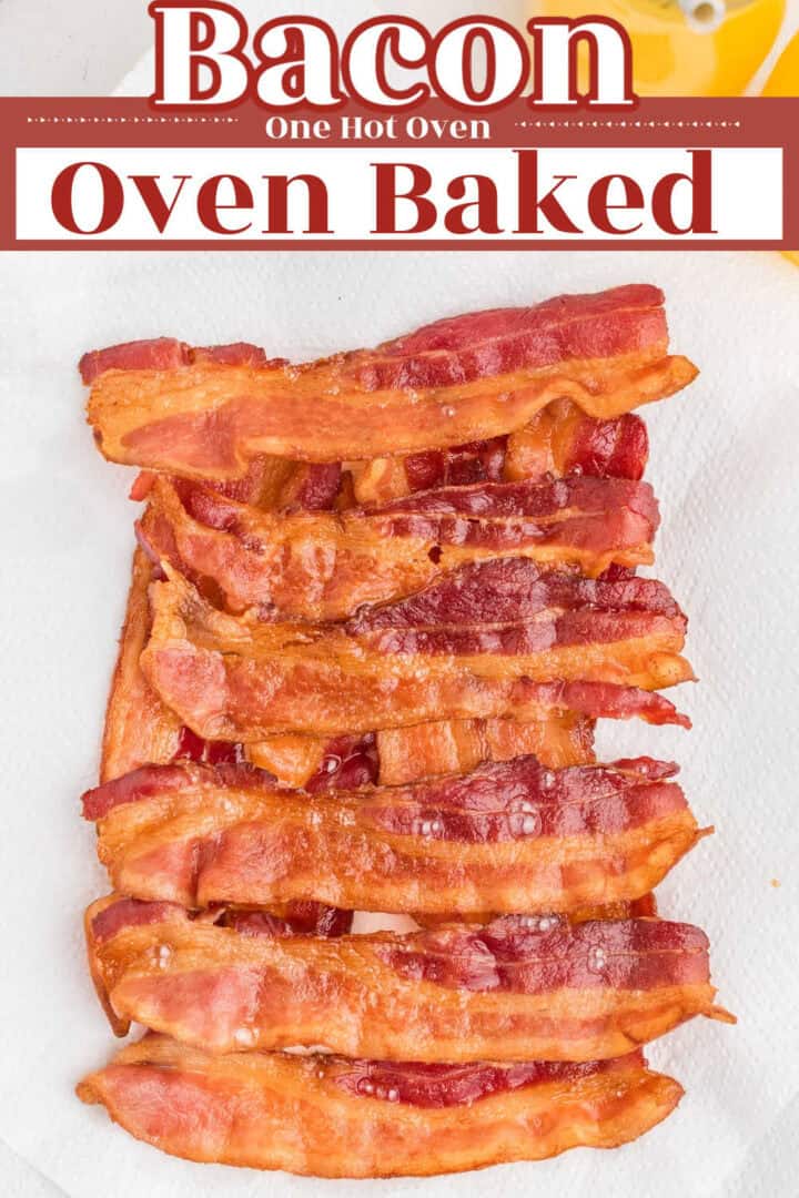 Several strips of cooked bacon are arranged on a white paper towel with a text overlay that reads “Bacon One Hot Oven Oven Baked.”.
