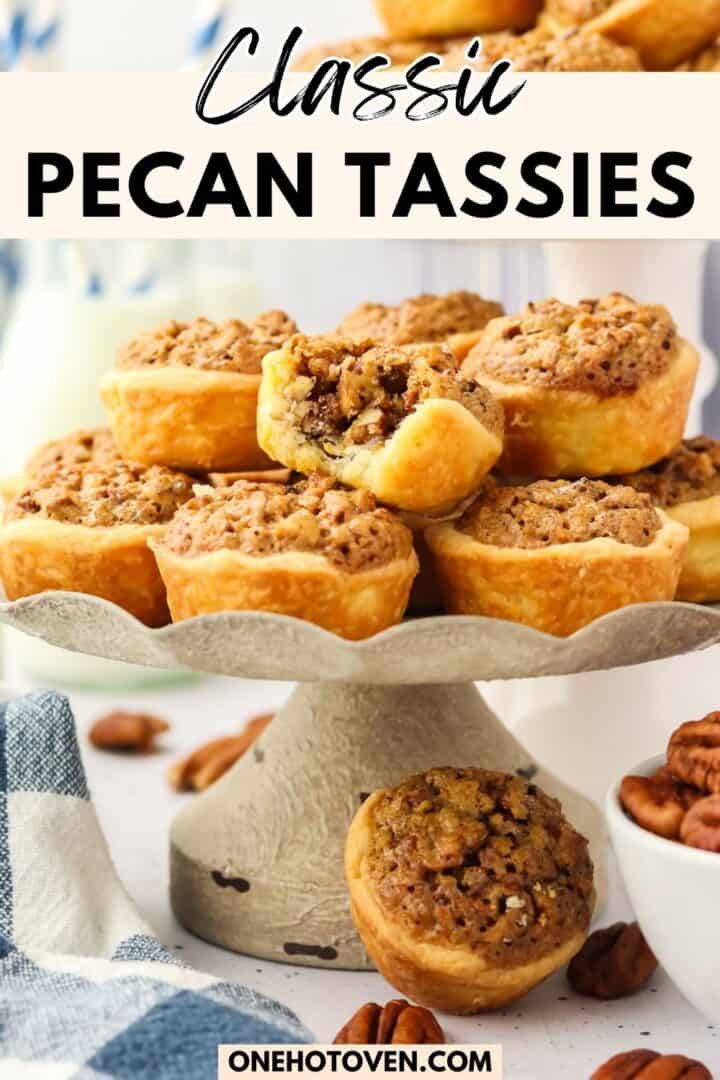 A cake stand holds a stack of pecan tassies with crumbly tops, surrounded by pecans and a blue plaid napkin; "Classic Pecan Tassies" text appears above.