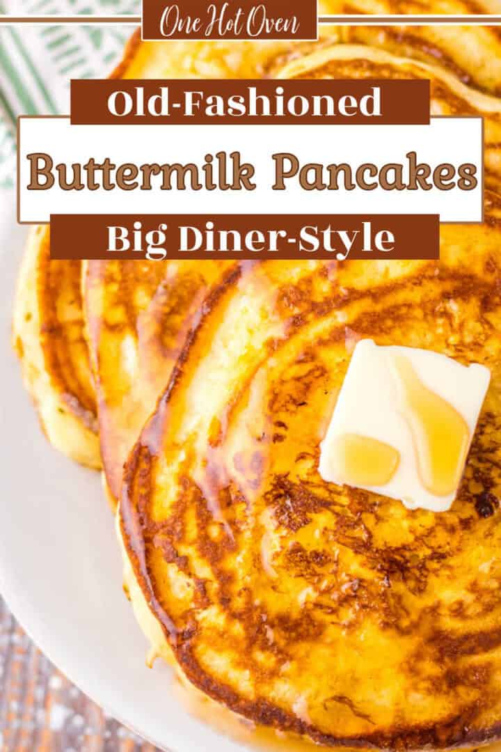 A plate of large, golden brown buttermilk pancakes topped with a pat of butter and syrup, with text reading “Old-Fashioned Buttermilk Pancakes Big Diner-Style.”.