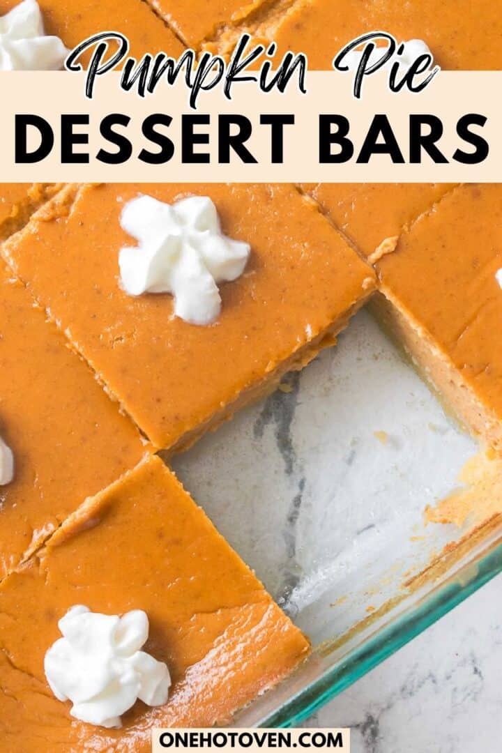 Pumpkin pie dessert bars in a glass baking dish, cut into squares, with whipped cream dollops on top of some bars.